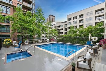 Outdoor lounge with luxurious pool & spa